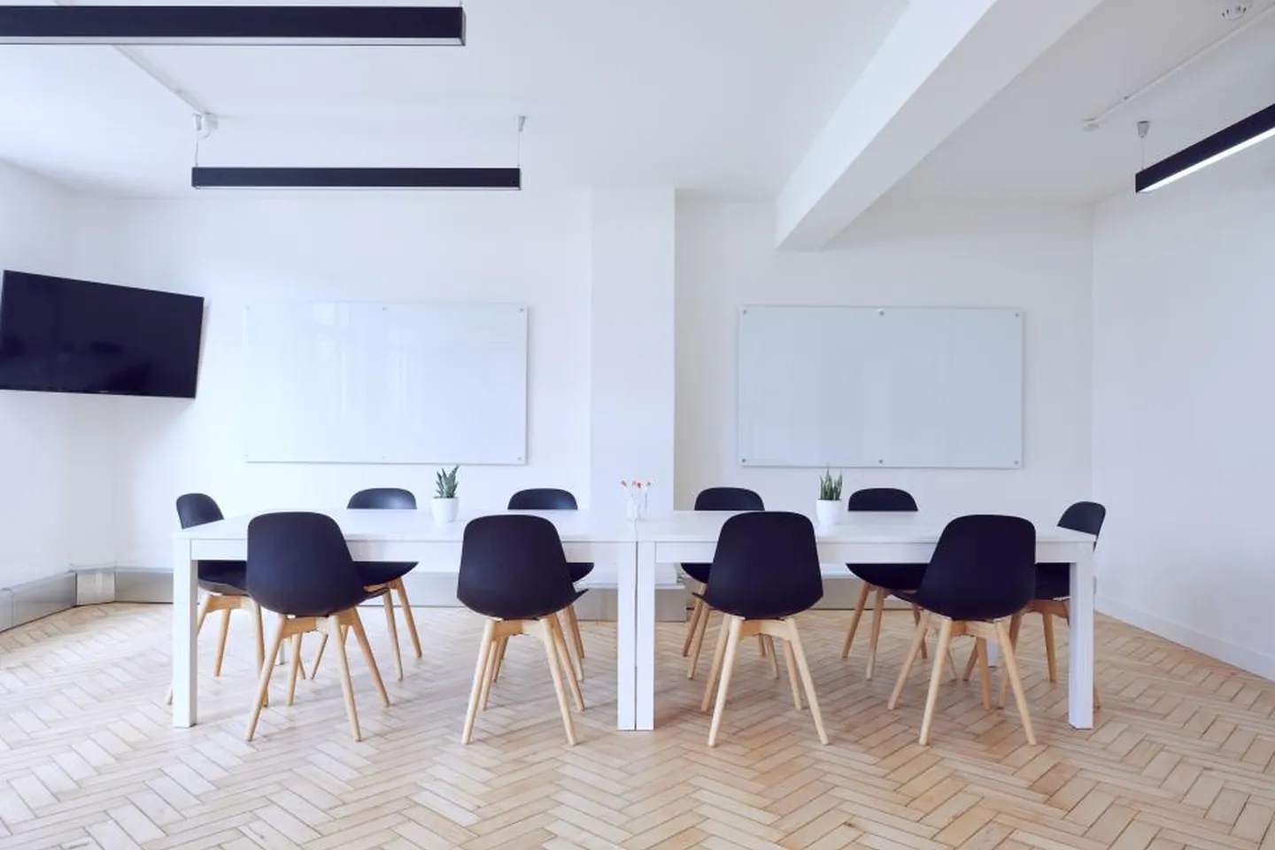 A bright, modern meeting room set for a project consultation.
